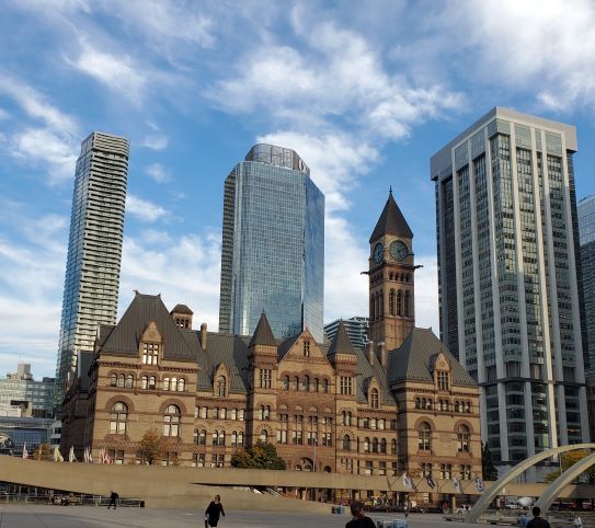 view of Toronto old city hall with skyscrapers in the background