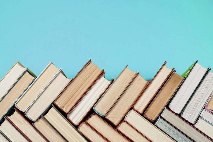 top view of books stacked in a row