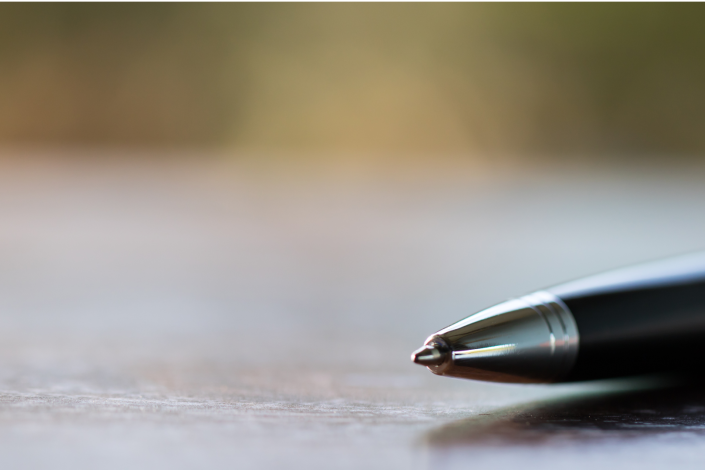 pen lying on a desk